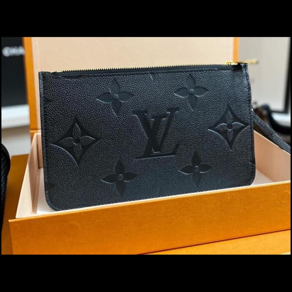 Brand new Louis Vuitton neverfull pouch